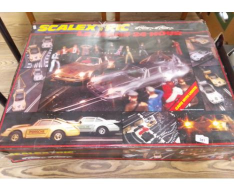 A Scalextric Le Mans 24 hour boxed set with cars, etc.  