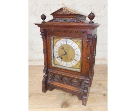 A W&H oak cased architectural bracket clock, height 43cm.Condition:- General wear through age and use, handle missing from gl