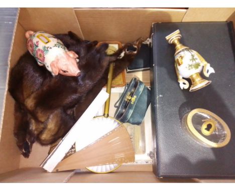 A box of assorted items including Quimper pig money bank, a Herder glass trinket box, opera glasses, furs, dressing table war