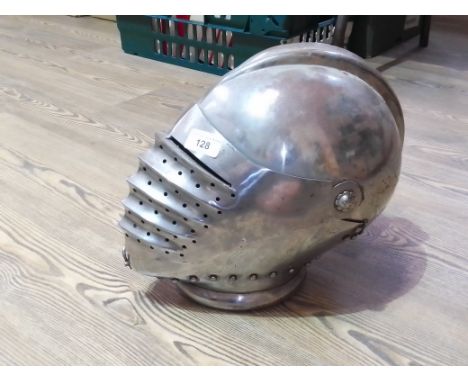 A Victorian reproduction of a German Maximilian style helmet with hinged up visor and side plates.  