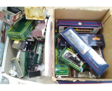 A box of model railway including a Bachmann tank engine 80097, several Bachmann rolling stock, an Airfix engine and another, 