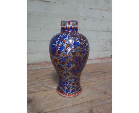 A Chinese vase, marked with red seal and double ring to base, height 23cm.Condition:- General wear through age and use, chip 