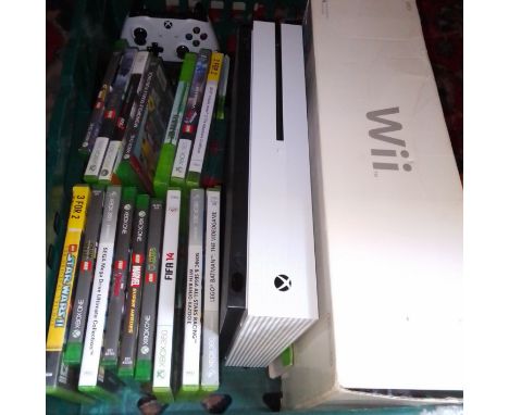An Xbox One with games together with a Wii console.  