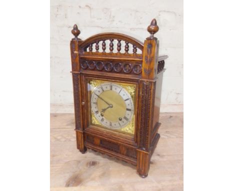 A W&H oak cased architectural bracket clock, height 38cm.Condition:- General wear through age and use, with pendulum, no key,