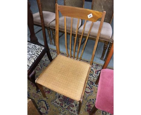 A light mahogany stick back chair