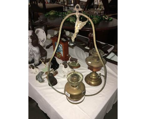 A Victorian hanging brass oil lamp and Victorian copper oil lamp
