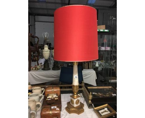 A gilded ormulu table lamp