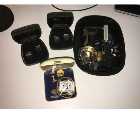 A quantity of miscellaneous including multi-tools, cufflinks etc