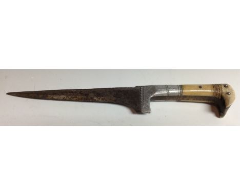 An Indian/Persian pesh kabz dagger, 18cm single edged pointed blade with broad spine, two-piece horn and bone grip, steel spi