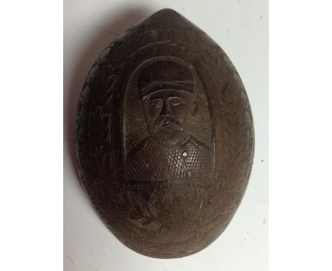 The Thousand Days War, Columbia - a treen coconut drinking bowl, carved in relief with a named portrait of General Benjamin H