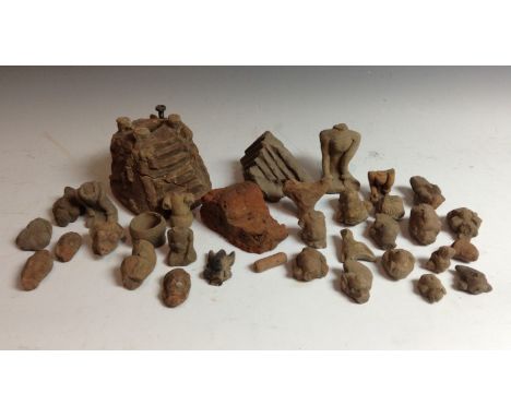 Antiquities - terracotta archaeological finds from Majaphit, Java, including fragmentary heads of deities, mythical beasts, a