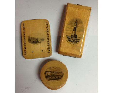 A Mauchline ware cased hourglass, the rectangular front cover printed with Beachy Head Lighthouse, hook clasp, suspension loo