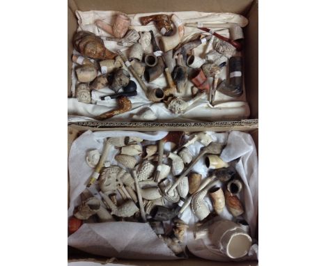 A collection of mid-18th century and later fragmentary clay and stoneware pipes, pipe bowls and shafts, including a substanti