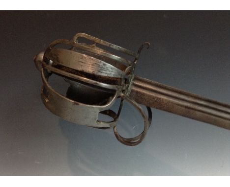 An early 18th century basket hilted cavalry broadsword, 86cm multi-fullered blade, bar and panel hilt, wooden grip, globular 