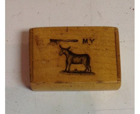 A Victorian novelty cedar rectangular snuff box, the hinged cover printed with a pictographic scene Axe My Ass, 6cm wide, c. 