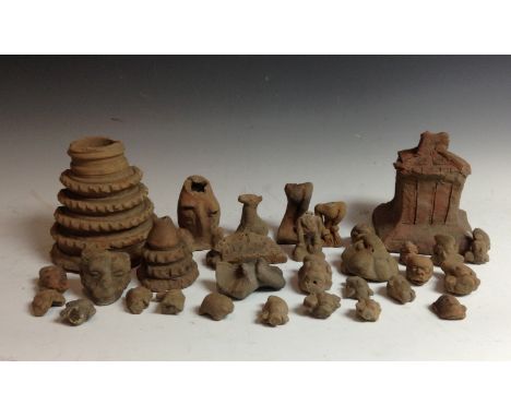 Antiquities - terracotta archaeological finds from Majaphit, Java, including fragmentary heads of deities, mythical beasts, a