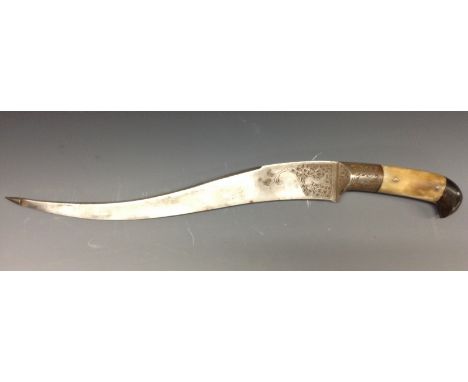An Indian khanjar dagger, 32.5cm serpentine double-edged blade chased with stylised leafy stems, two-piece horn grip, 45cm lo