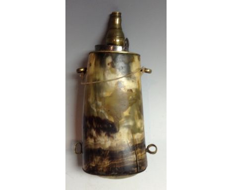 An 18th century cattle horn powder flask, brass spout, suspension rings and butt cap, steel mechanism, 18cm long