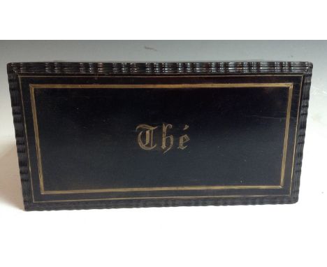 A 19th century French brass marquetry and ebonised rectangular tea caddy, hinged cover with inlaid inscription within a wavy 