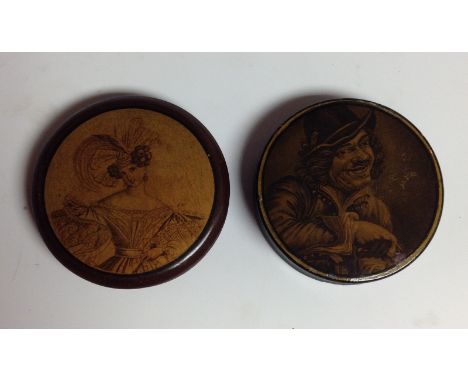 A 19th century circular papier-mâché snuff box, the push on cover applied with a portrait of a lady, 9cm diam; another, simil