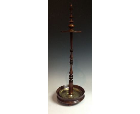 An early 19th century mahogany treen church warden pipe stand, turned column and finial, dished base with brass liner, ball f