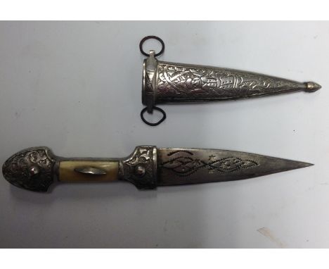A Caucasian qama or kindjal dagger, 10cm pointed double edged blade, two-piece horn grip, 21.5cm long overall