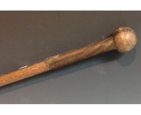 Tribal Art - a Zulu hardwood knobkerrie status stick, globular head above a broad two-tione decorated copper band, 106cm long