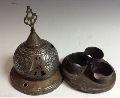 A 19th century Middle Eastern Islamic silver damascened brass hanging mosque lamp, decorated with stylised flowers, leafy ste