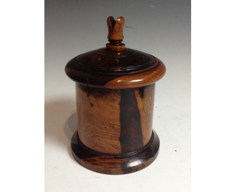 A Victorian cylindrical treen string box, of typical form, the finial carved open and set with a blade for cutting, screw-on 
