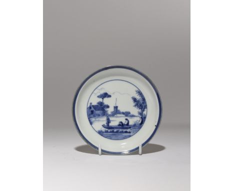 A JAPANESE VAN FRYTOM STYLE DISH EDO PERIOD, C.1690-1710 Decorated in underglaze blue, the well painted with a rural scene of