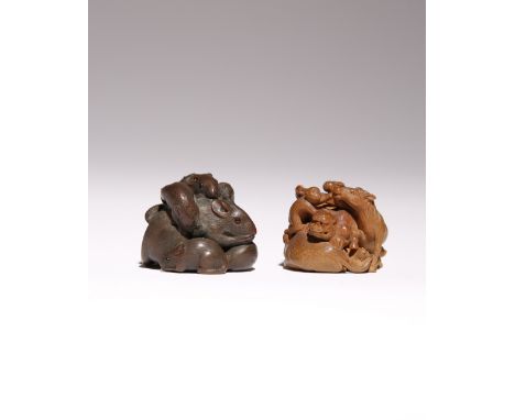 TWO JAPANESE WOOD NETSUKE OF ANIMALS MEIJI PERIOD, 19TH CENTURY The first intricately carved as the Junichi, the twelve zodia