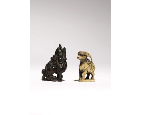 TWO JAPANESE NETSUKE OF MYTHICAL CREATURES EDO AND MEIJI PERIOD, 18TH AND 19TH CENTURY The first in wood and depicting a shis