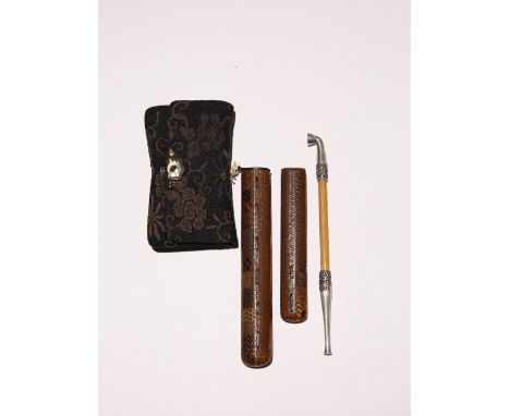 A JAPANESE SMOKING SET, KISERUZUTSU, TABAKOIRE AND KISERU LATE EDO OR EARLY MEIJI PERIOD, 19TH CENTURY The pipe case made up 