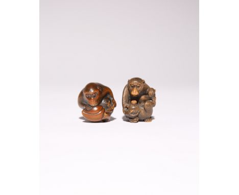 TWO JAPANESE WOOD NETSUKE OF MONKEYS MEIJI PERIOD, 19TH CENTURY The first primate clutching a large peach before him, its eye