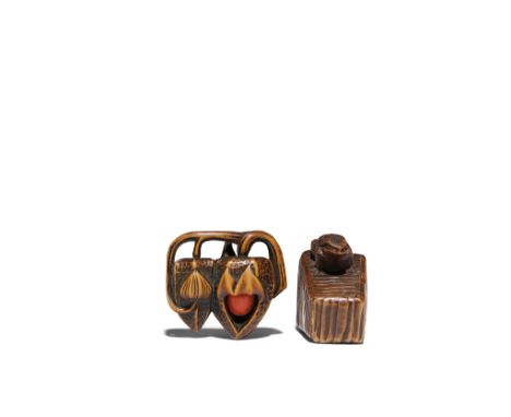 TWO JAPANESE WOOD NETSUKE MEIJI PERIOD, 19TH CENTURY One carved as a small frog dozing off on a wooden bucket, the front part