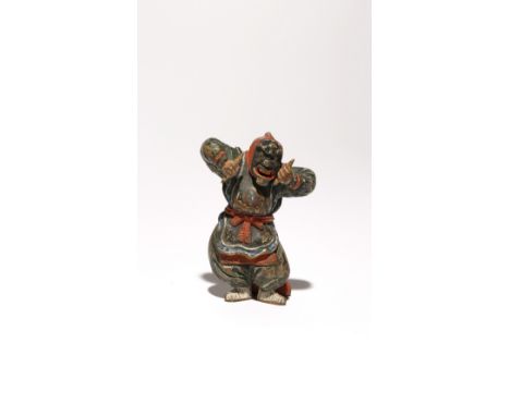 A TALL JAPANESE SAISHIKI PAINTED WOOD NETSUKE EDO PERIOD, 18TH CENTURY In the style of Yoshimura Shuzan, carved as a bugaku d