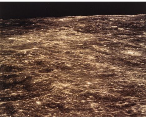 ** Apollo 8.-  An oblique view of the lunar horizon, December, 1968, vintage chromogenic print, NASA caption and watermark "A