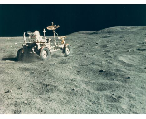 ** Apollo 16.- Duke (Charles) John Young drives the Rover in a speed trial, April 1972; Charles Duke examines House Rock, Apr