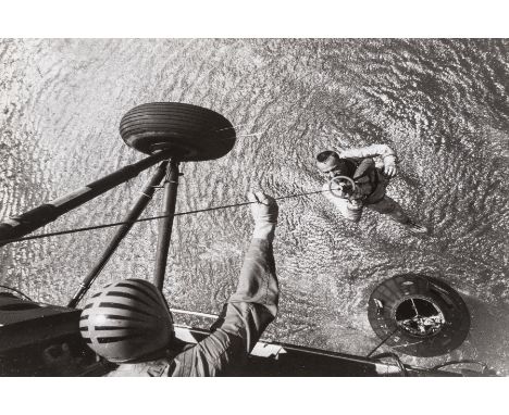 **  Alan Shepard, the first American in space, winched aboard a helicopter after splashdown, 5 May 1961; Formal portrait of A
