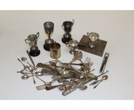 A collection of silver items, to include five various trophy cups, a monogrammed mug,  assorted teaspoons, a pair of wishbone