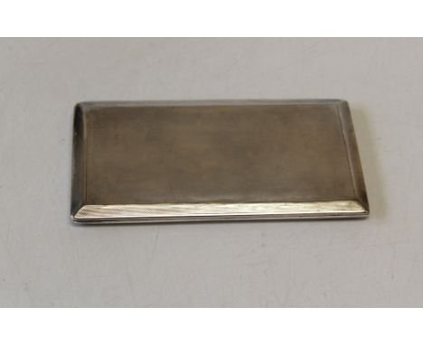 Asprey, an Edwardian silver cigarette case, patent 21914 with sliding sprung hinge and engine turned exterior, London 1936. 1