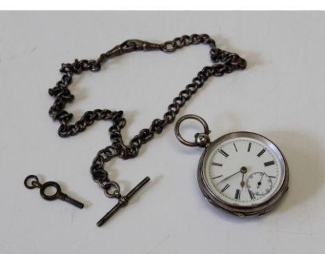  A silver open-faced pocket watch, with engine turned decoration, the white enamel dial with Roman numerals and subsidiary se