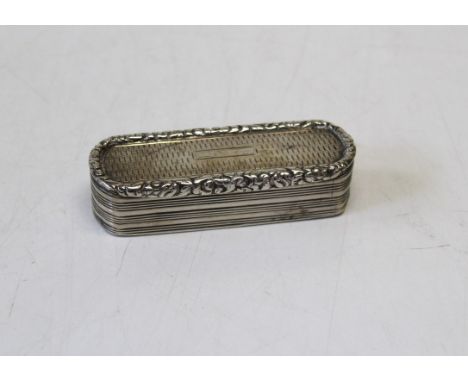 
An early Victorian silver oblong snuff box having engine turned decoration and rounded ends, the silver gilt interior having