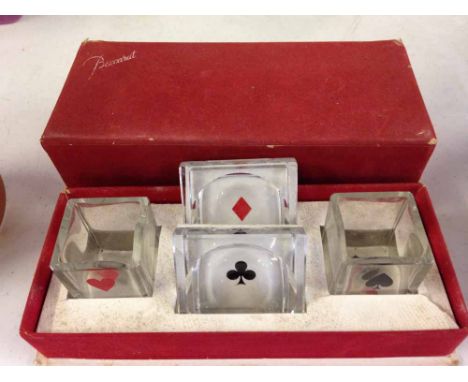 A c1950s boxed Baccarat glass playing card suit decorated dishes.