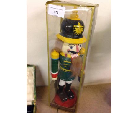 A boxed modern traditional wooden toy soldier nutcracker, 35cm tall.