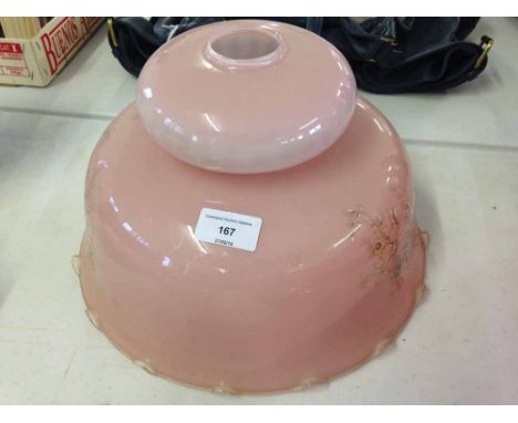 A vintage pink glass light shade.