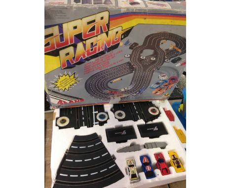A boxed c1980-90s Super Racing Scalextric style slot car racing set - appears complete.