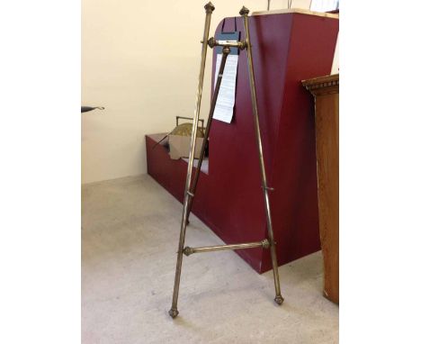 Victorian brass easel. Approx 60" tall and 24" wide at base.