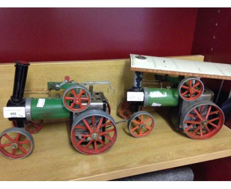 An unboxed Mamod Steam Tractor with another incomplete example.