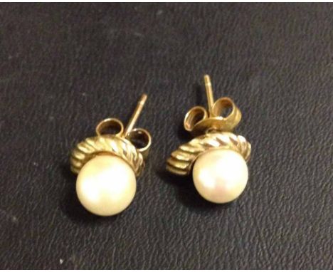 A pair of 9ct gold & pearl earrings.